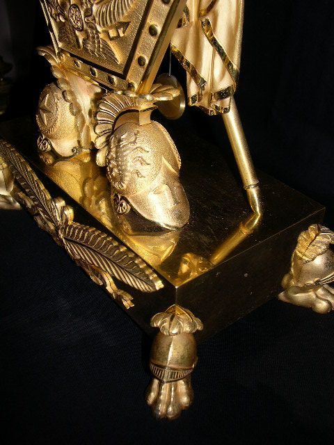 Détails bronze doré Pendule Empire